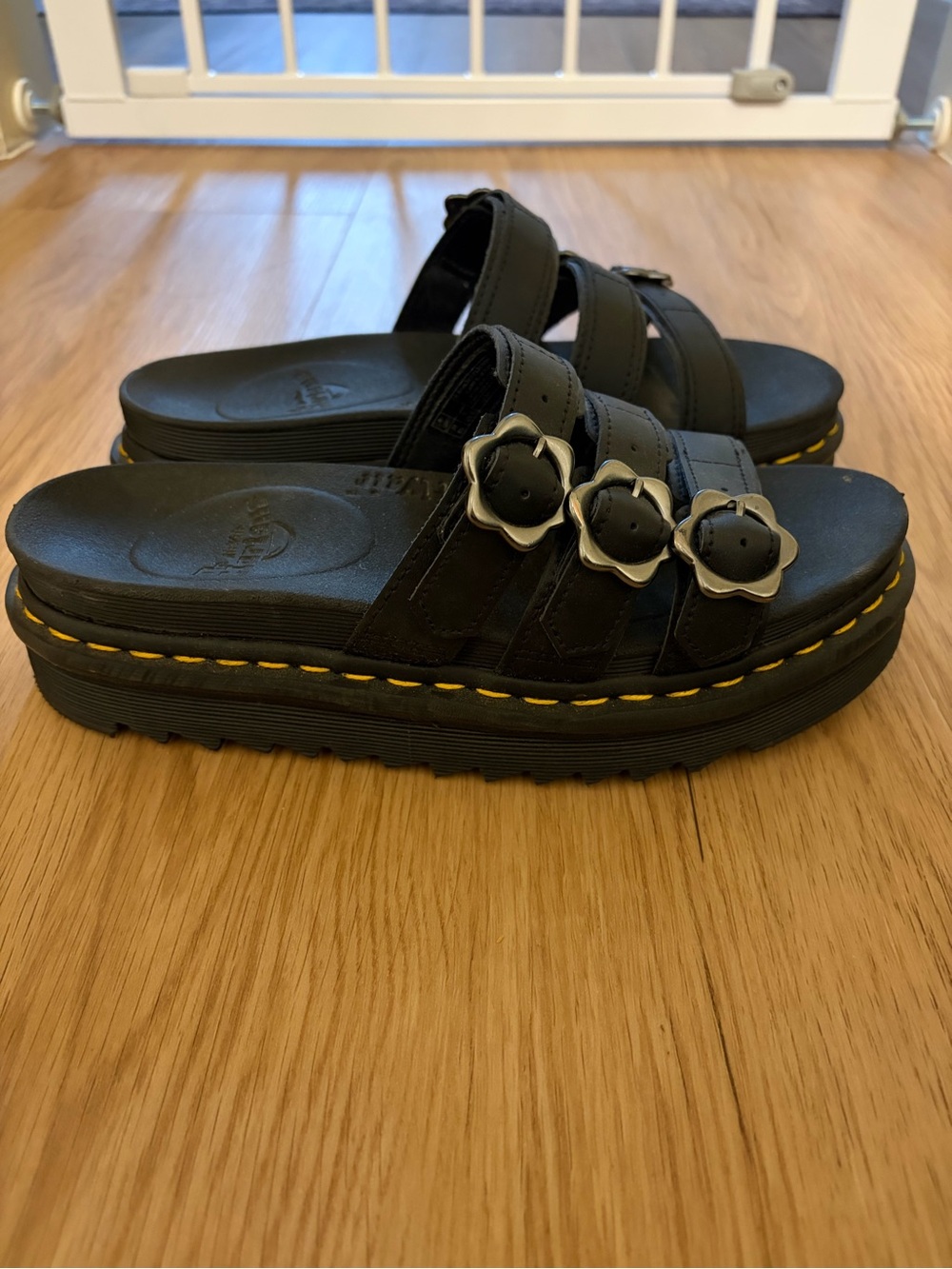 Dr. Martens Black Platform Slide Sandals with Silver Floral Buckles